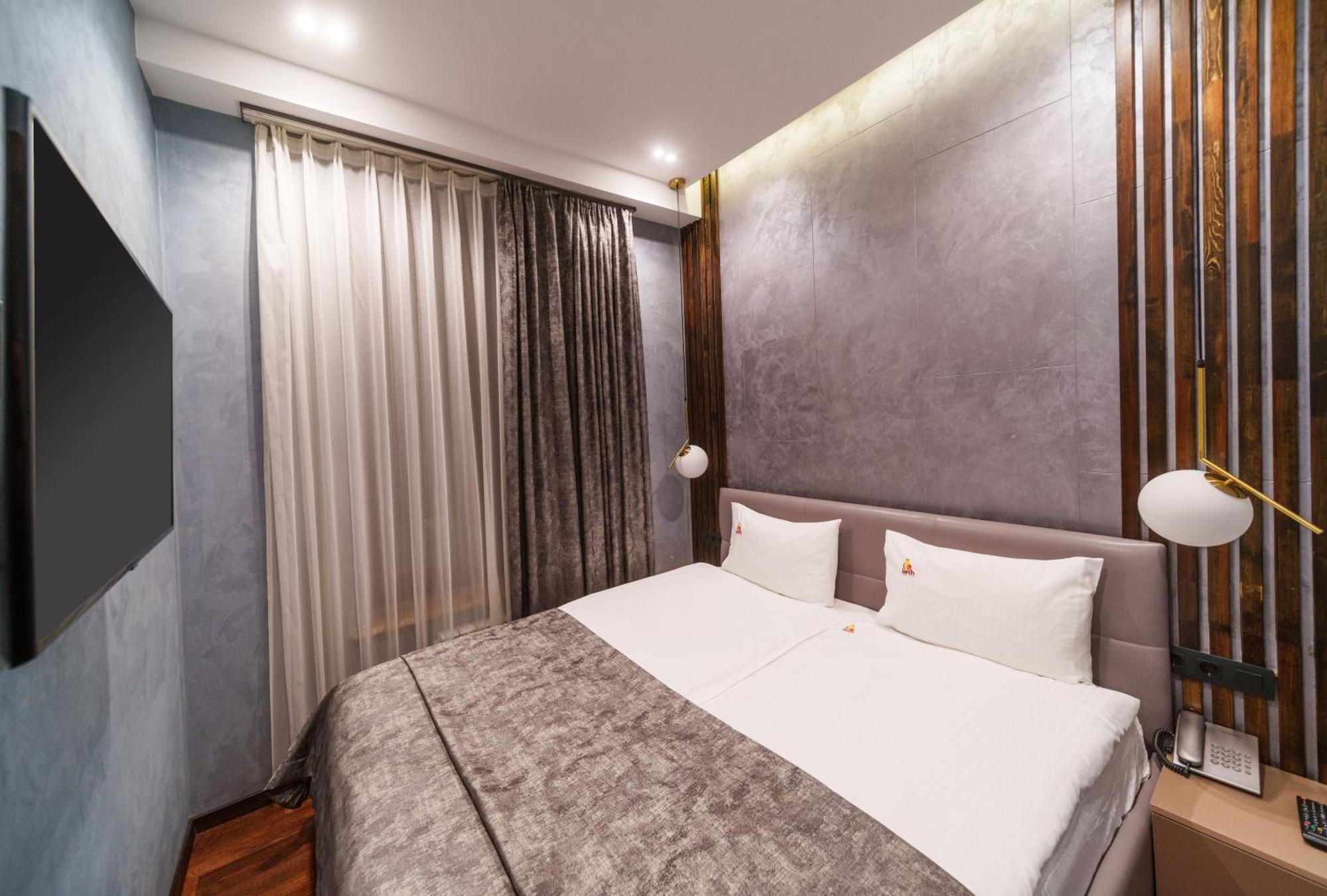 Arch Apart Hotel Ереван Стая снимка
